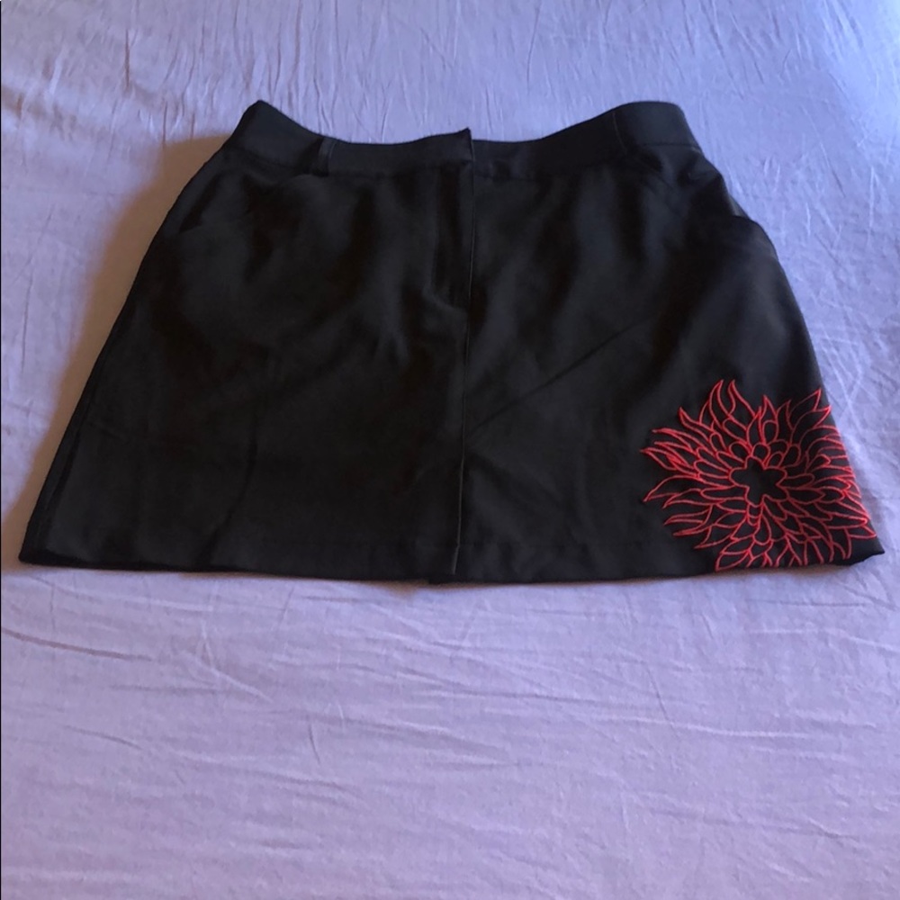 Three Nike ladies golf skorts